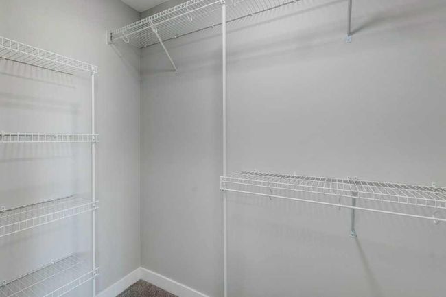 82 Edith Green Nw, Home with 4 bedrooms, 3 bathrooms and 2 parking in Calgary AB | Image 18