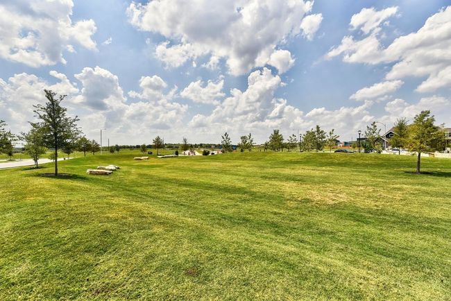 With open green spaces, the community offers ideal spots to walk your pets, giving your furry friends room to run and explore | Image 36