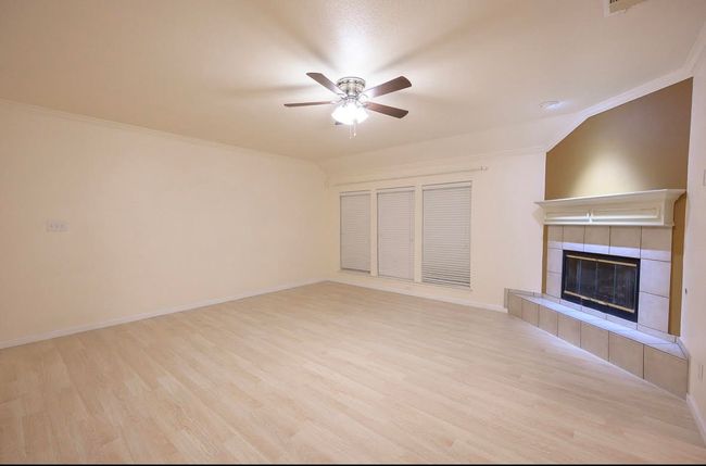 Family room is open to the kitchen and formal dining rooms | Image 4