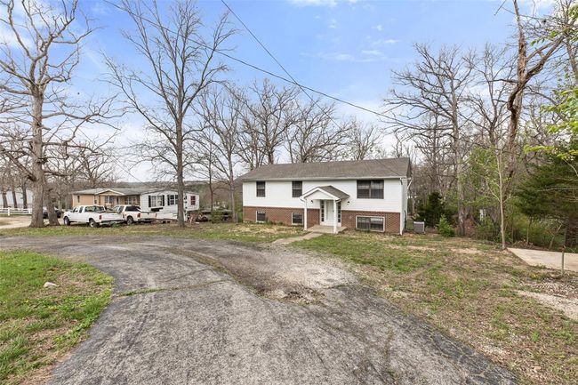 Raised ranch featuring brick siding | Image 39