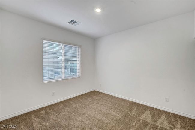 Unfurnished room featuring carpet, visible vents, recessed lighting, and baseboards | Image 44
