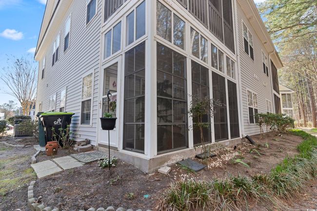 View of side of property featuring a sunroom | Image 28