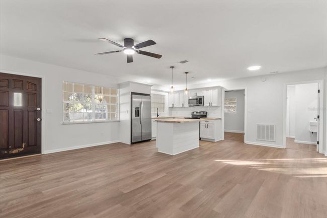 Open Floor Plan... View from Livingroom toward the Kitchen/Dining Area | Image 15