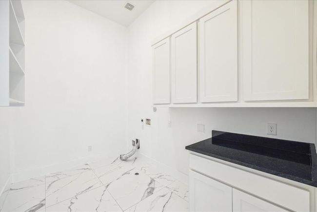 UTILITY/LAUNDRY ROOM ON FIRST FLOOR | Image 25