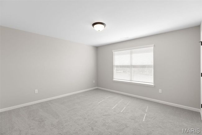 Spare room featuring light colored carpet and baseboards | Image 20