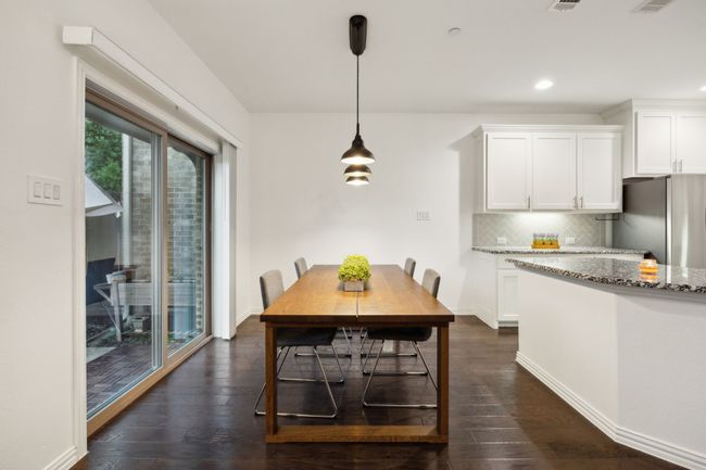 Dining room featuring visible vents, recessed lighting, and dark wood-style flooring | Image 9