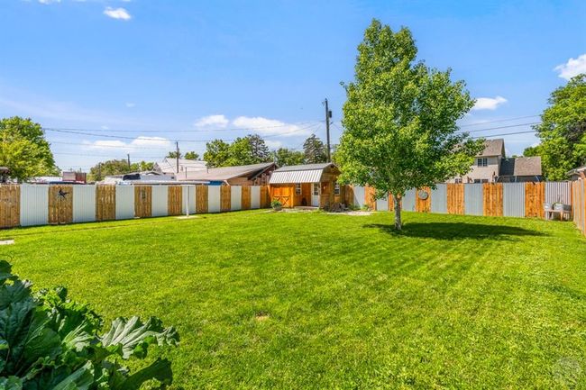 huge fenced yard with 6 foot privacy fence at 210 Yellowstone Avenue, Laurel, MT 59044 | Image 19