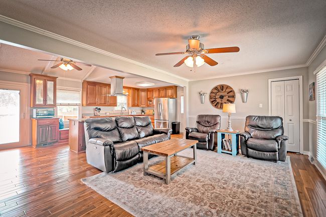Open living room and kitchen area. | Image 6