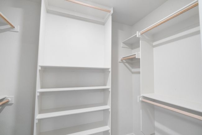 View of spacious closet | Image 16