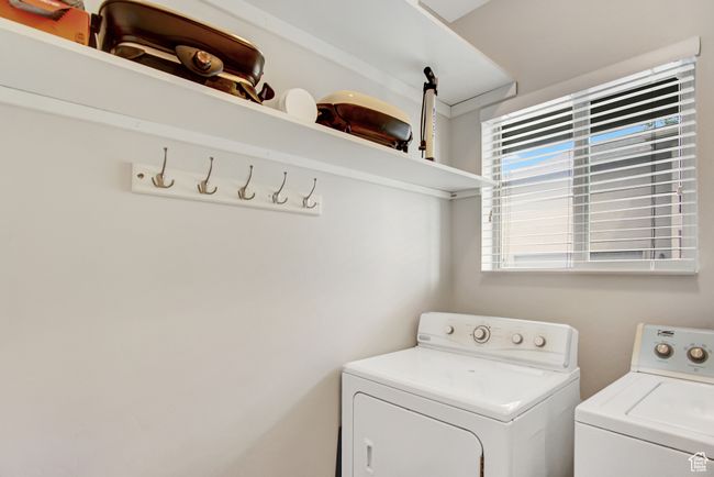 Washroom with washer and clothes dryer | Image 17