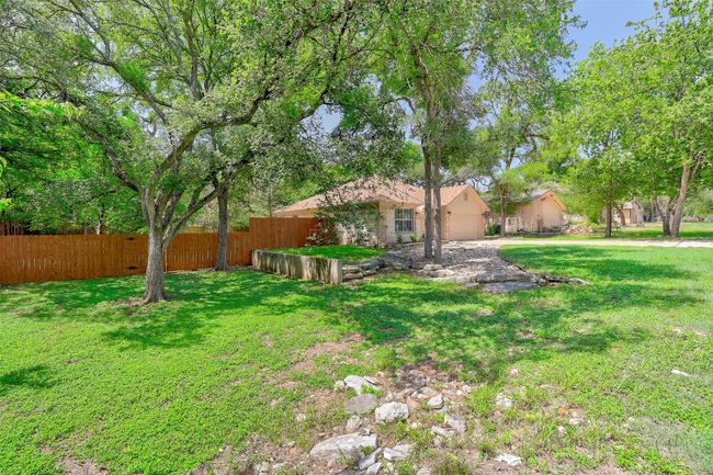 View of large side front yard | Image 31