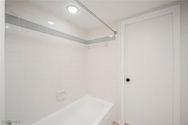 Bathroom with shower / bath combination and recessed lighting | Image 18