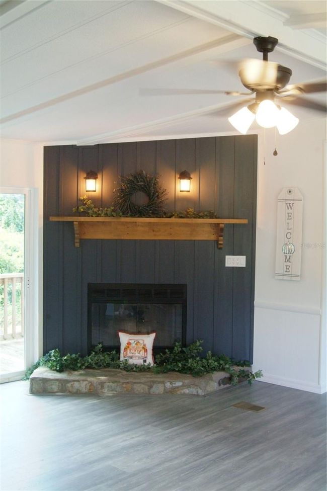 Custom Fireplace with Wooden Wall and Mantle with Stone Hearth | Image 11