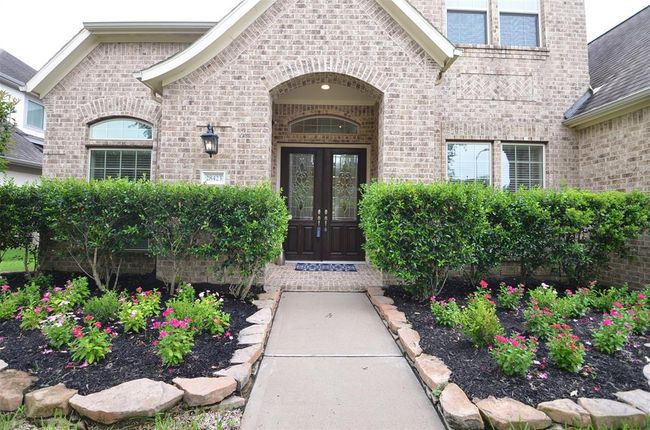 Welcoming front entrance with double doors. | Image 5