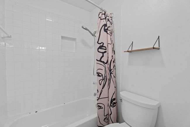 A door off the vanity area provides nice privacy for the water closet with the shower/tub combo and toilet. | Image 20