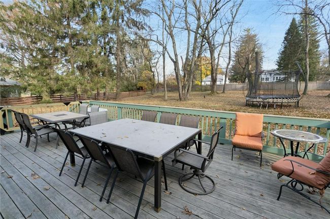 Large, level rear yard is perfect for all types of outdoor play for all ages. | Image 26
