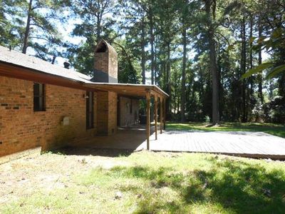 View of yard featuring a deck | Image 2