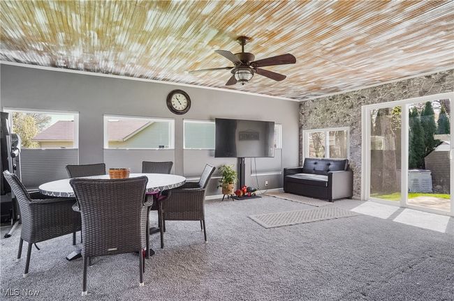Sunroom featuring a wealth of natural light | Image 20