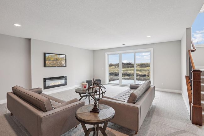 Spacious Lower with Electric Fireplace | Image 23