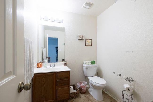 Bathroom with vanity and tile patterned flooring | Image 8