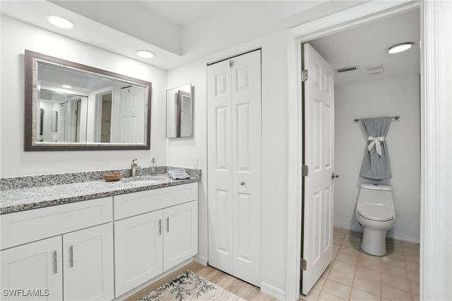 Bathroom with vanity, a closet, and recessed lighting | Image 27