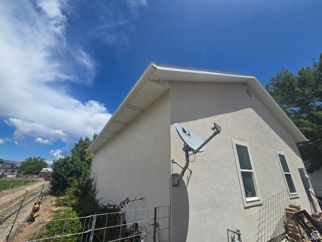 View of property exterior featuring stucco siding | Image 58
