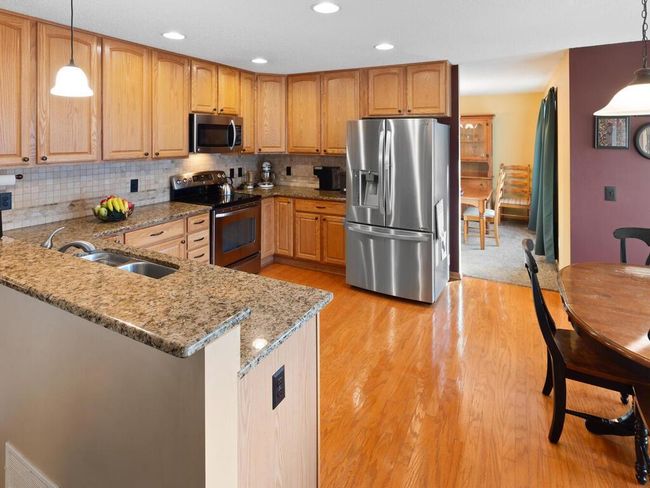 Lots of counter space with granite counter tops and SS appliances | Image 16