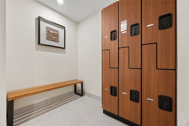 Hall with light tile patterned floors and baseboards | Image 15