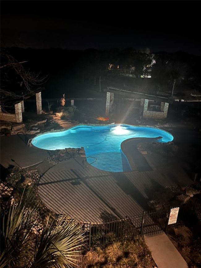 Pool at twilight featuring a community pool | Image 26