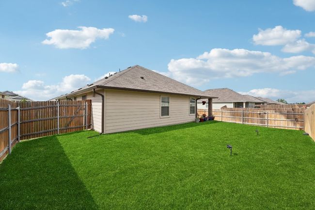 Back of property featuring a fenced backyard and a shingled roof | Image 32