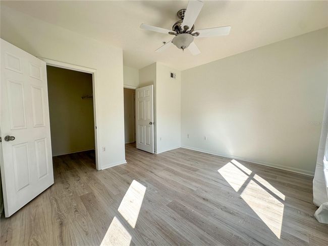 Primary Bedroom and Walk In Closet | Image 8