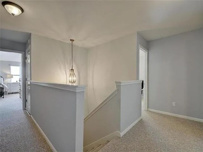 Hall featuring an upstairs landing and carpet | Image 15