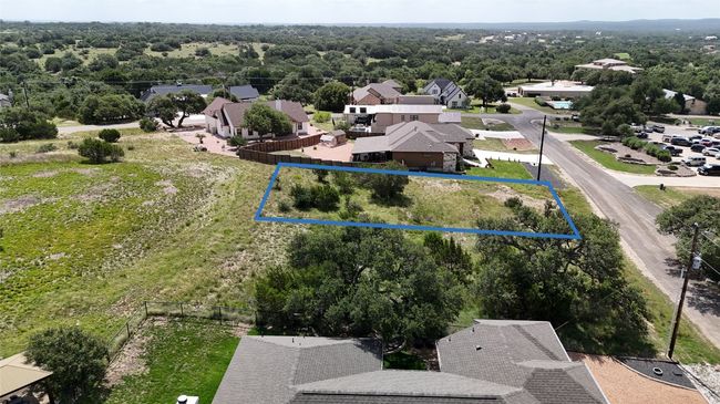 Aerial view of residential area with property boundaries highlighted | Image 7