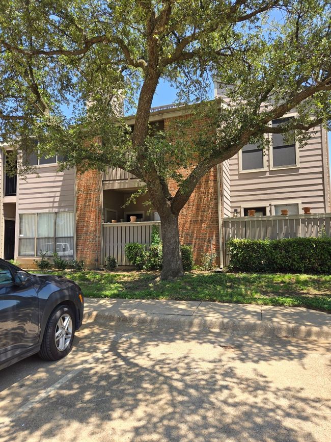 Townhome / multi-family property featuring brick siding | Image 11