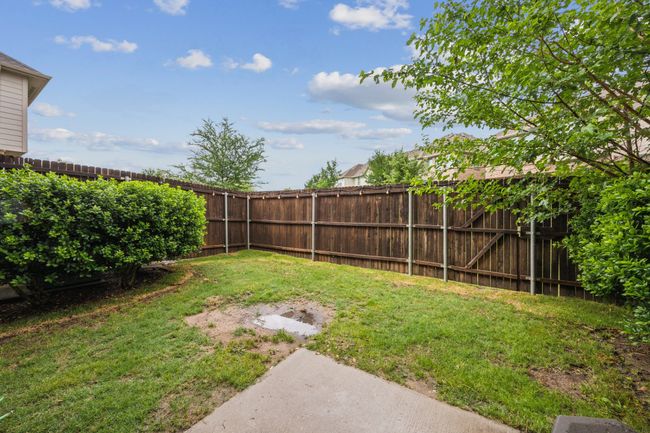 View of yard featuring a fenced backyard | Image 23