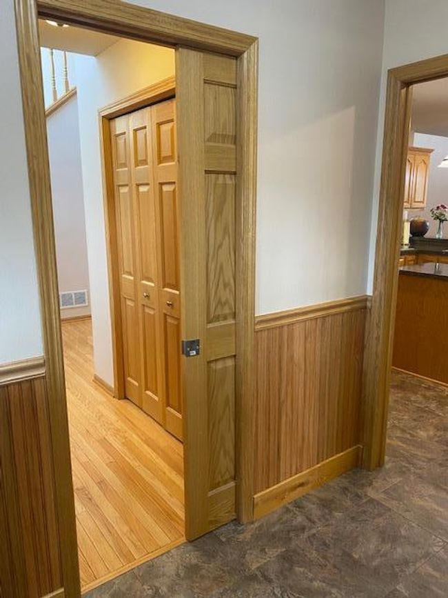Pocket doors to keep the mudroom out of sight. | Image 38