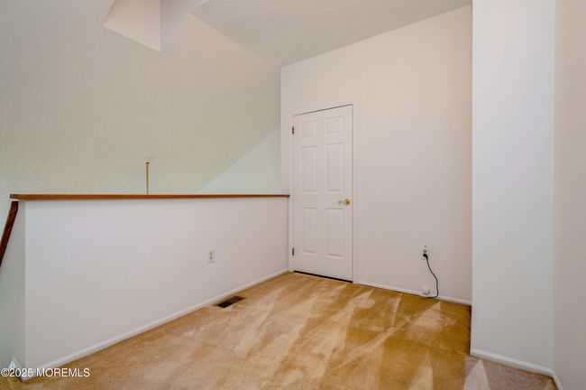 Loft looking to a walk in closet | Image 21