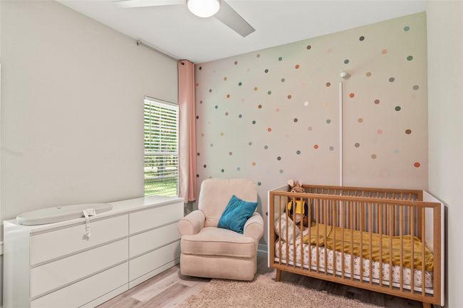 Comfortable secondary bedroom with walk-in closet. | Image 11