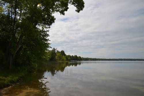 000 Birch Pointe Dr, Kewadin, MI, 49648 | Card Image