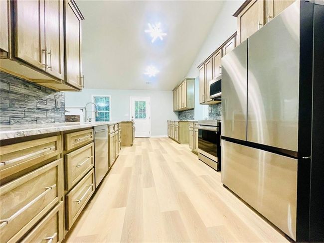 7675 Lanier View Rdg, House other with 3 bedrooms, 2 bathrooms and 2 parking in Cumming GA | Image 8