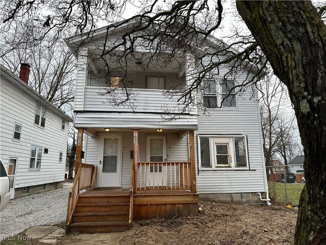 Back of property featuring a balcony and covered porch | Image 21