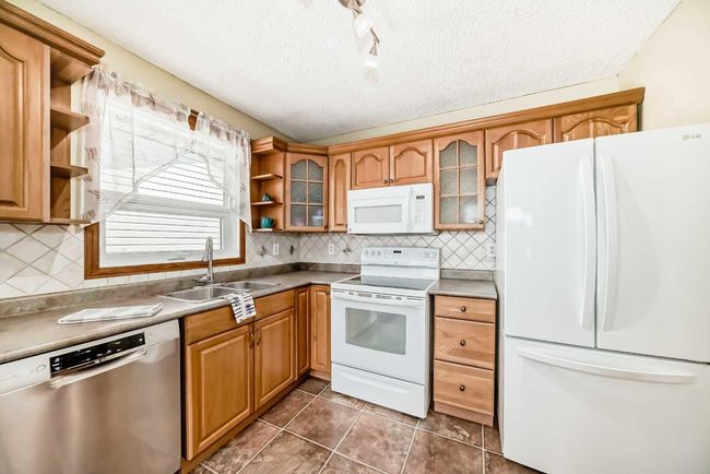 440 Big Springs Drive Se, House other with 3 bedrooms, 2 bathrooms and 1 parking in Airdrie AB | Image 5