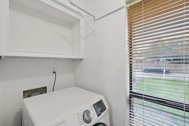 Laundry area with washer / clothes dryer | Image 21