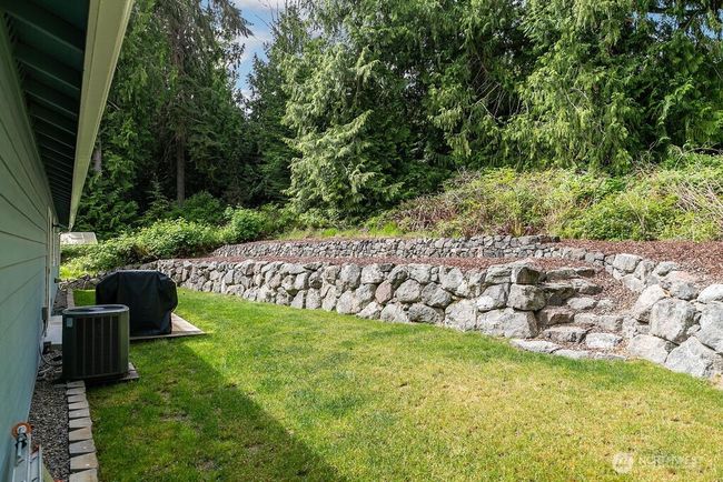 Tiered backyard which is ready for your ideas, plenty of area for gardening. | Image 23