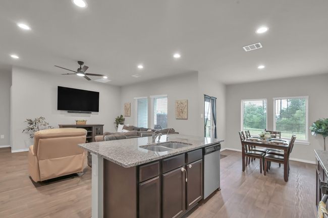 This alternative view from the kitchen helps you take in the open view to the scenic backyard! This is the perfect place for your next birthday party! | Image 13