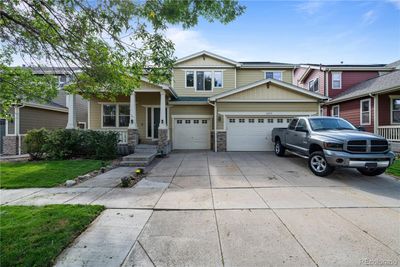 12235 Helena Street, House other with 4 bedrooms, 2 bathrooms and 3 parking in Commerce City CO | Image 1