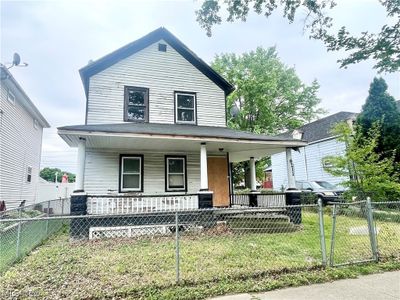 View of front of house featuring covered porch and a front lawn | Image 2