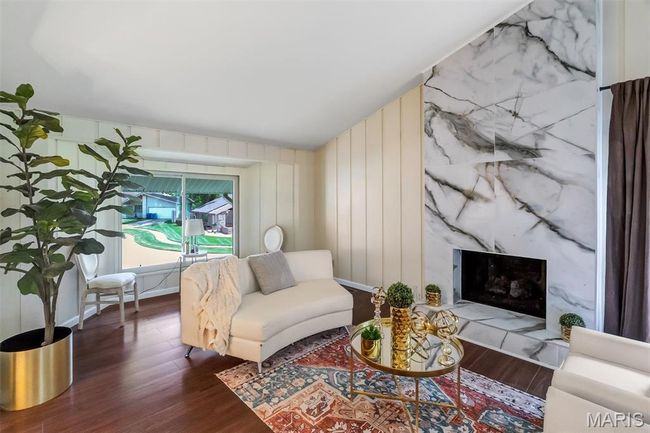 Foyer featuring stairs and wood finished floors | Image 7