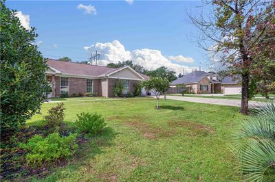 Single story home with a front lawn | Image 3