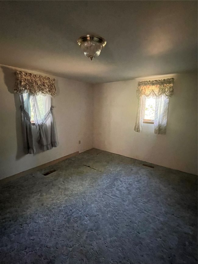 Main floor bedroom. | Image 6